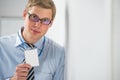 Happy smiling business man showing blank badge Royalty Free Stock Photo