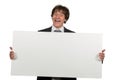 Happy smiling business man showing blank signboard, isolated over white background Royalty Free Stock Photo