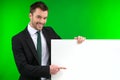 Happy smiling business man showing blank signboard. Royalty Free Stock Photo