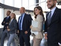 Happy smiling business team standing in a row at office Royalty Free Stock Photo