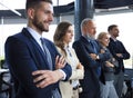 Happy smiling business team standing in a row at office Royalty Free Stock Photo