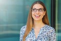 Happy smiling business woman with glasses looks to the side the copy space area Royalty Free Stock Photo