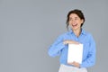 Happy business woman holding digital tablet showing mockup screen. Royalty Free Stock Photo