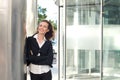 Happy smiling business woman outside office building Royalty Free Stock Photo