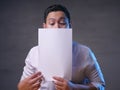 Happy Smiling Businessman Covering His Face With Blank Paper Card Royalty Free Stock Photo