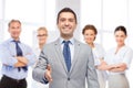 Happy smiling businessman in suit shaking hand Royalty Free Stock Photo