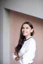 Happy smiling businesswoman. Caucasian brunette female model in business success concept studio shot Royalty Free Stock Photo