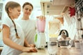 The happy smiling caucasian family in the kitchen preparing breakfast Royalty Free Stock Photo