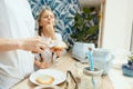 The happy smiling caucasian family in the kitchen preparing breakfast Royalty Free Stock Photo