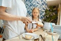 The happy smiling caucasian family in the kitchen preparing breakfast Royalty Free Stock Photo