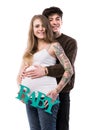 Happy smiling couple in love expecting child