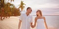 Happy smiling couple over summer beach and sea Royalty Free Stock Photo
