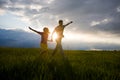 Happy smiling couple run on the field Royalty Free Stock Photo
