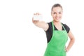 Happy smiling employee handing blank visit card Royalty Free Stock Photo