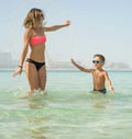 Happy smiling family having fun on tropical white beach Maldives islands. Mother and cute son. Positive human emotions, feelings Royalty Free Stock Photo