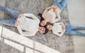 Top view.Happy smiling family hugging while lying on the floor in the room at home. C Royalty Free Stock Photo