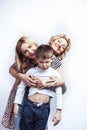 happy smiling family together posing cheerful on white background, lifestyle people concept, mother with son and teenage Royalty Free Stock Photo