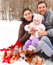 Happy smiling family with at the winter picnic