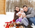 Happy smiling family with at the winter picnic Royalty Free Stock Photo