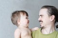 Happy smiling father and baby daughter portrait. Happiness in simple lifestyle