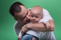 Happy smiling father embracing his baby boy Royalty Free Stock Photo