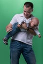 Happy smiling father embracing his baby boy Royalty Free Stock Photo