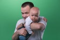 Happy smiling father embracing his baby boy Royalty Free Stock Photo