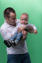 Happy smiling father embracing his baby boy Royalty Free Stock Photo