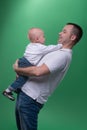 Happy smiling father embracing his baby boy Royalty Free Stock Photo