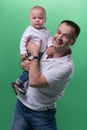 Happy smiling father embracing his baby boy Royalty Free Stock Photo