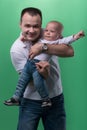 Happy smiling father embracing his baby boy Royalty Free Stock Photo