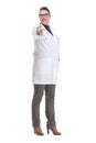 Happy smiling female doctor pointing at the camera against white background Royalty Free Stock Photo