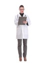 Happy smiling female doctor with stethoscope writing on clipboard Royalty Free Stock Photo