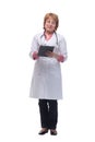 Happy smiling female doctor with stethoscope writing on clipboard Royalty Free Stock Photo