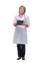 Happy smiling female doctor with stethoscope writing on clipboard Royalty Free Stock Photo