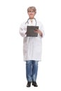 Happy smiling female doctor with stethoscope writing on clipboard Royalty Free Stock Photo