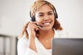 Happy, smiling and friendly call center agent wearing headset while working in an office. Portrait of confident Royalty Free Stock Photo
