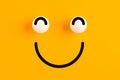 Happy smiling frog face icon on yellow background. Positive mood or feedback