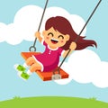 Happy smiling girl kid swinging on a swing Royalty Free Stock Photo