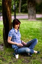 Happy smiling girl working online. Royalty Free Stock Photo