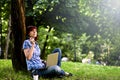 Happy smiling girl working online. Royalty Free Stock Photo