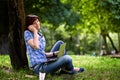 Happy smiling girl working online. Royalty Free Stock Photo