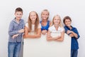 Happy smiling group of kids, boys and girls Royalty Free Stock Photo