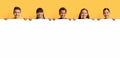 Happy smiling group of kids showing blank placard board Royalty Free Stock Photo