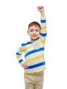Happy smiling little boy with raised hand Royalty Free Stock Photo