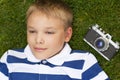 Happy smiling little boy with retro vintage camera Royalty Free Stock Photo