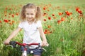 Happy smiling little girl with bicycle Royalty Free Stock Photo