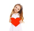 Happy smiling little girl child with big red paper heart on white Royalty Free Stock Photo