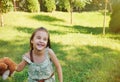 Happy smiling little girl playing with toy in the kindergarden i