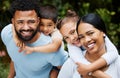 Happy, smiling and loving family bonding enjoying fun moments together in the outdoors. Portrait of playful, joyful and Royalty Free Stock Photo